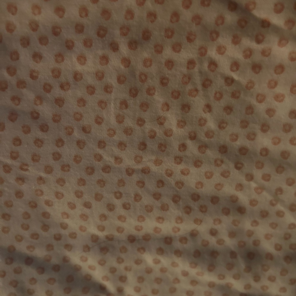 Pink polka dot sheet set.